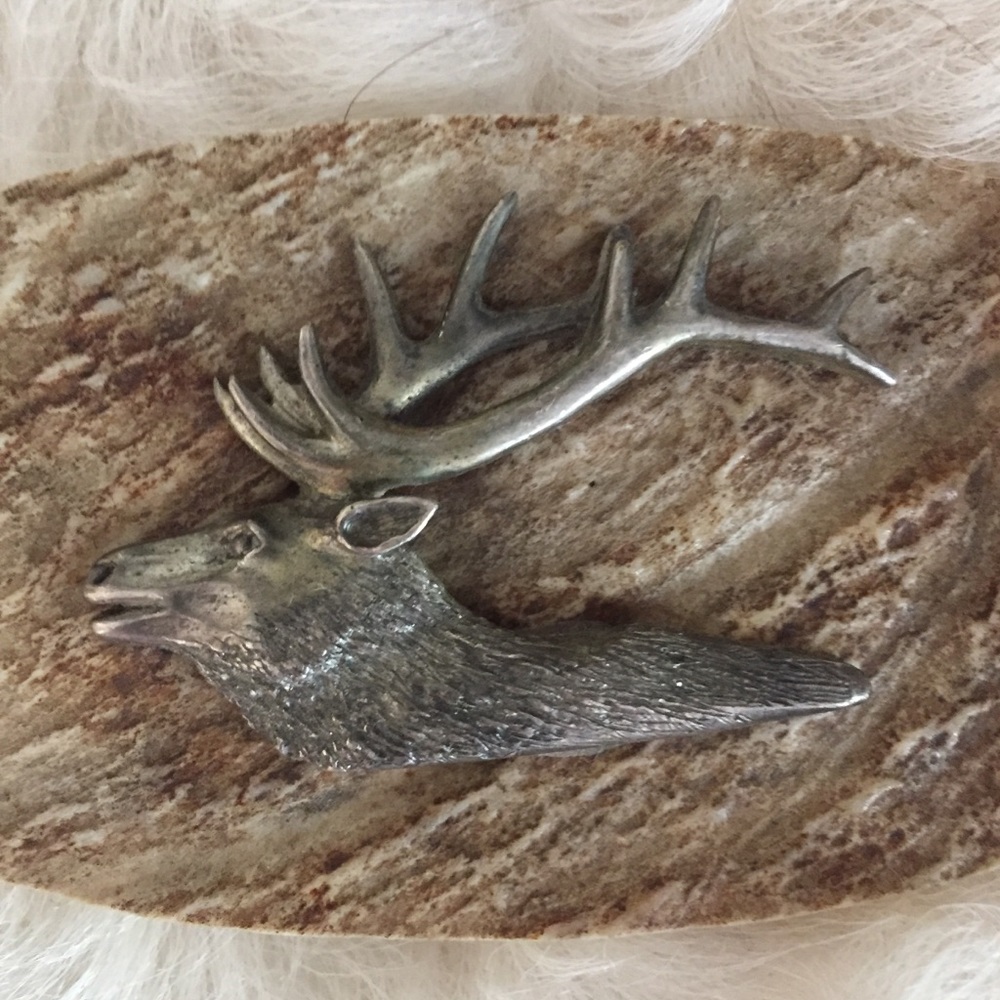 Handcrafted belt buckle.